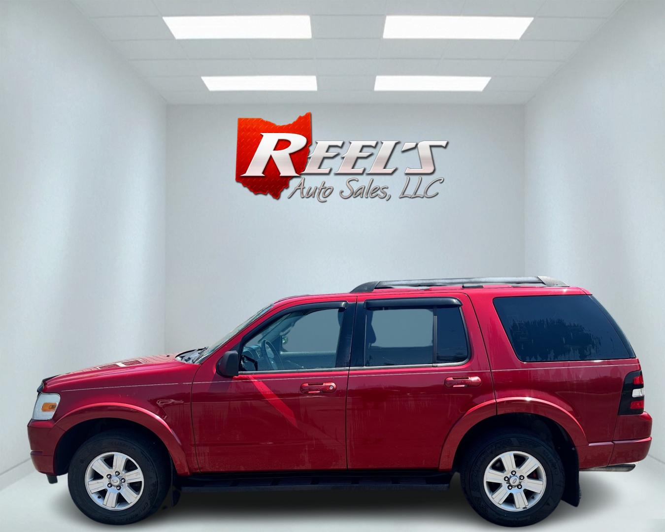 2009 Red /black Ford Explorer XLT (1FMEU73E89U) with an 4.0L V6 engine, 5-Speed Automatic transmission, located at 11115 Chardon Rd. , Chardon, OH, 44024, (440) 214-9705, 41.580246, -81.241943 - This 2009 Ford Explorer is a reliable and capable SUV, offering a 4.0L V6 engine paired with a 5-speed automatic transmission and full-time 4WD system. With a 3,500-pound towing capacity, it's suitable for moderate hauling needs. Additionally, the power driver's seat provides comfort and convenience - Photo#7